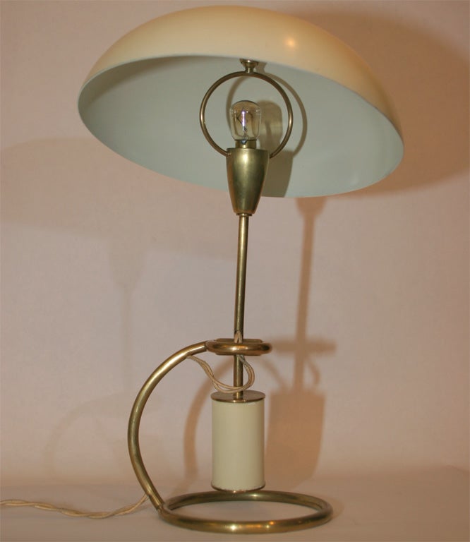 Mid-Century Modern An Articulated Table Lamp signed Arredoluce