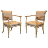 Pair painted and parcel gilt armchairs