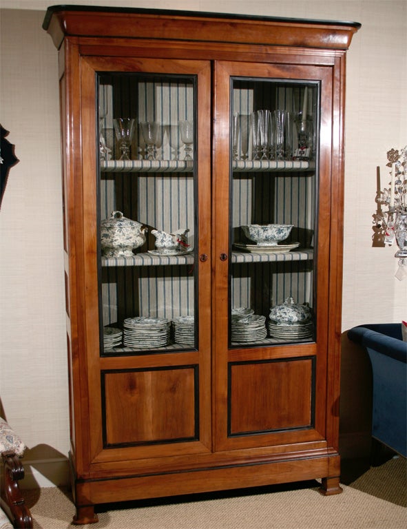 A Louis Phillipe Fruitwood Bookcase with Vintage Ticking Fabric