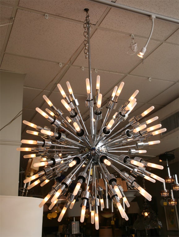 SOLD  Incredible scale with this Italian made Starburst Sputnik chandelier from Lightolier.  With 75 electrified arms it is quite extraordinary.  Bright shiny chrome.  Impressive.  New connection wires. 75 light bulbs (15w each) included as shown. 