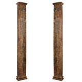 A Large Decorative Pair of Painted Columns