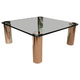 Square Glass Cocktail Table with Silvered Column Legs