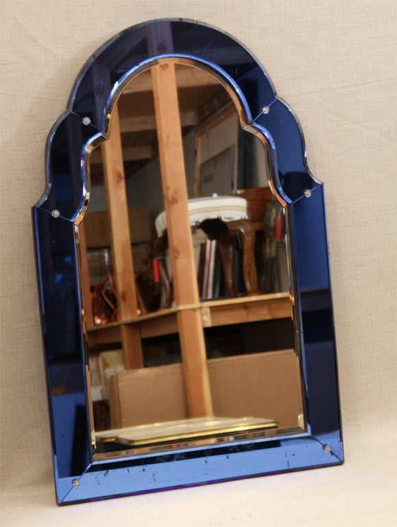 Art Deco Mirror with Central Beveled Glass Bordered by an Arched Cobalt Glass Frame. England, c. 1930.<br />
<br />
20 inches wide x 31 inches high