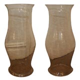Pair of large clear hurricanes