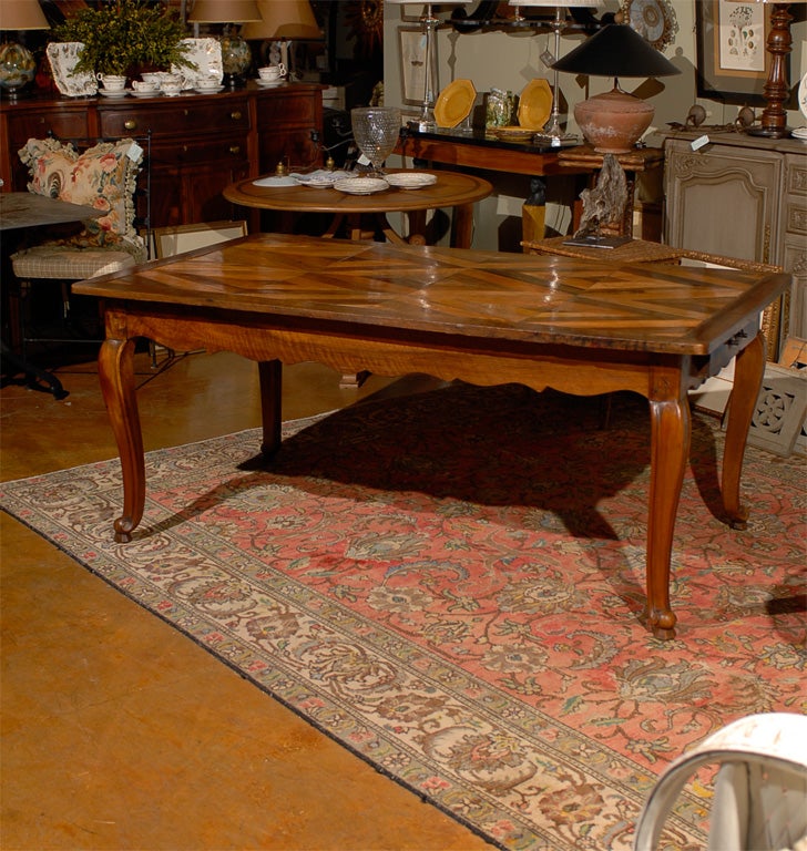 Lovely French parquet dining table with Queen Anne style legs.<br />
<br />
To see more items from Foxglove Antiques, please visit our website: www.foxgloveantiques.com
