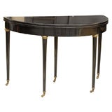 LACQUERED FLIP TOP ROUND DINING TABLE, EBONIZED,  SIGNED JANSEN