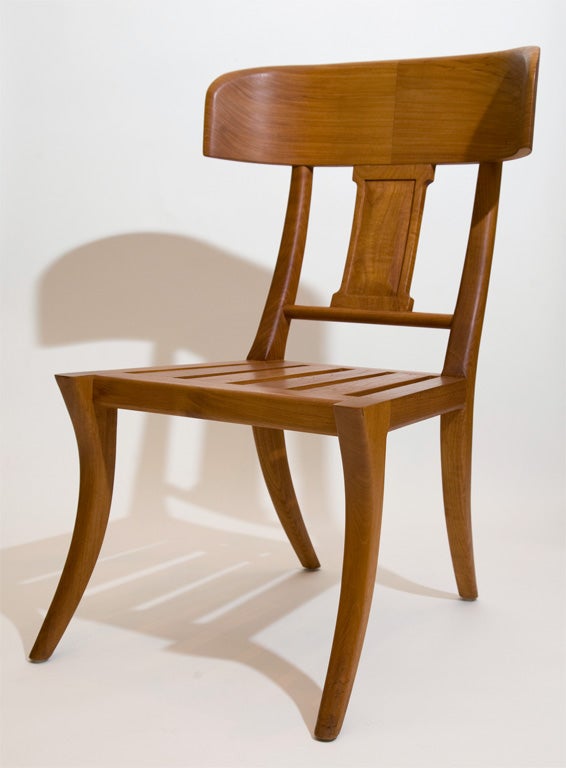Classic, handsome Klismos chair designed by Michael Taylor.  This beautiful teak chair design is still available at the Michael Taylor showroom, but we are able to offer the four chairs with no lead time and for far less the MT showroom.  The price