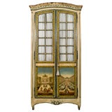 a  2 door  arte povera decorated  cabinet