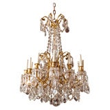 Louis XVI  style gilt bronze and crystal  12 light chandelier