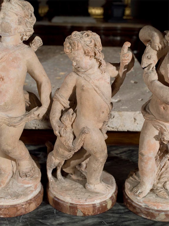 Terracotta a  group of French terracotta putti