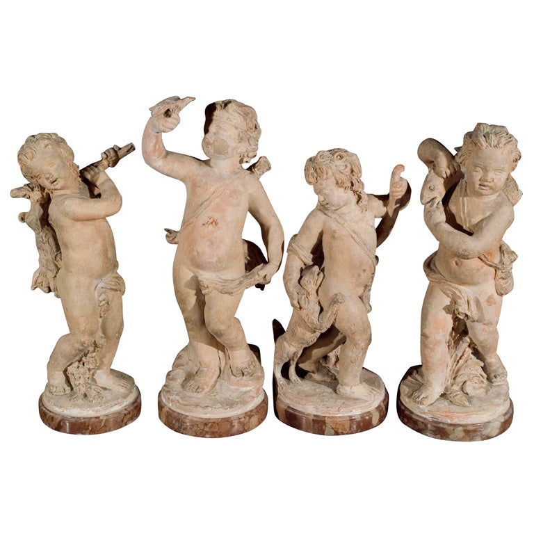 a  group of French terracotta putti