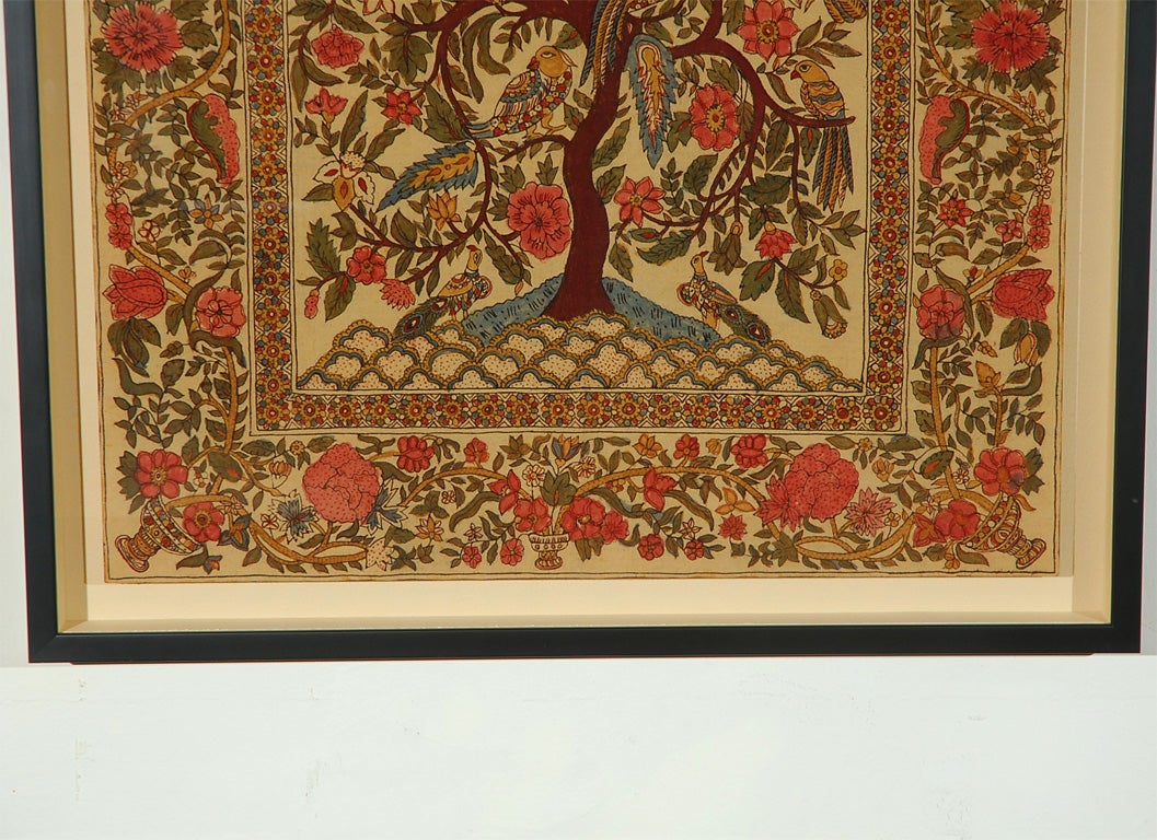 Painted textile.  Floral and bird motif in teal, greens, mustard and strawberry pink.  Framed to float in shadow box.  Size with frame:  47