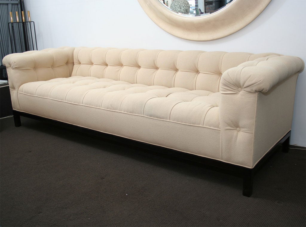 Chesterfield Sofa with an Ebonized Base.