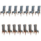 Rare set of 14 dining chairs by Rene Prou