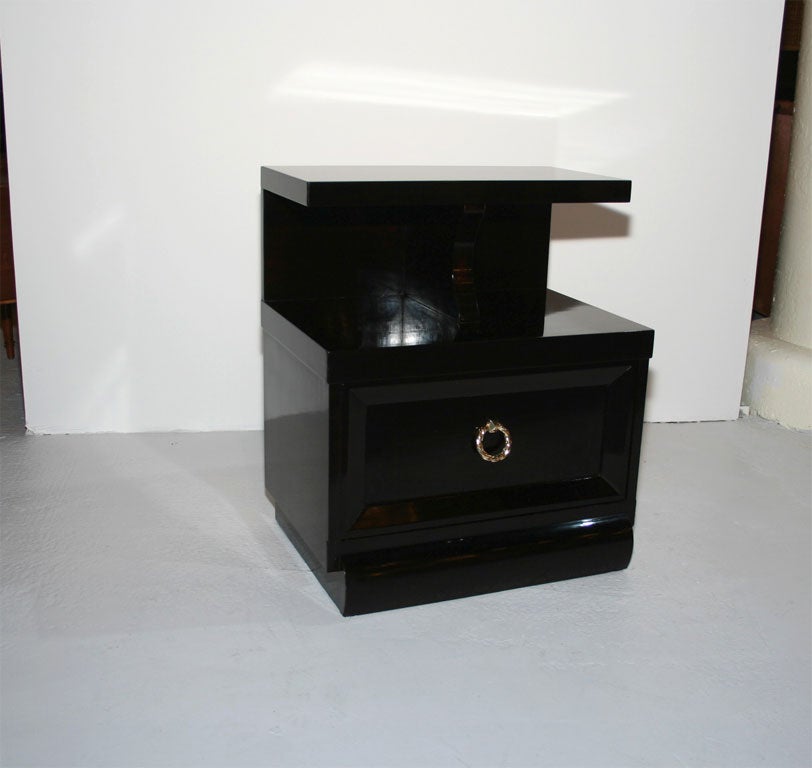 Pair of Ebonized Mahogany nightstands with polished brass hardware. Matching dresser currently available.