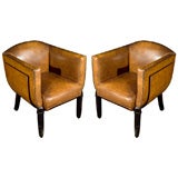 Pair of Important Art Deco Leather Arm Chairs