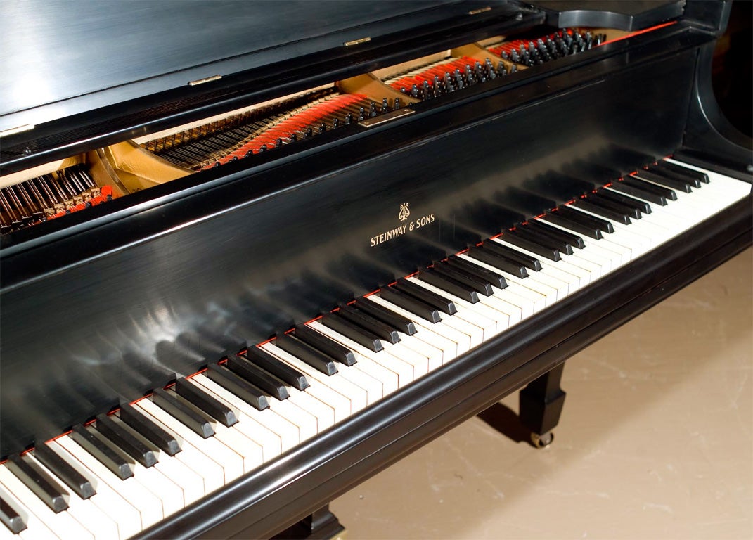 Stunning, fully refurbished, Steinway Grand Piano. Fine 1920s Steinway & Sons Model M rubbed sat in finished ebonized Grand Piano. Completely rebuilt and restored to pristine condition. Not one detail has been omitted in restoration. Serial number: