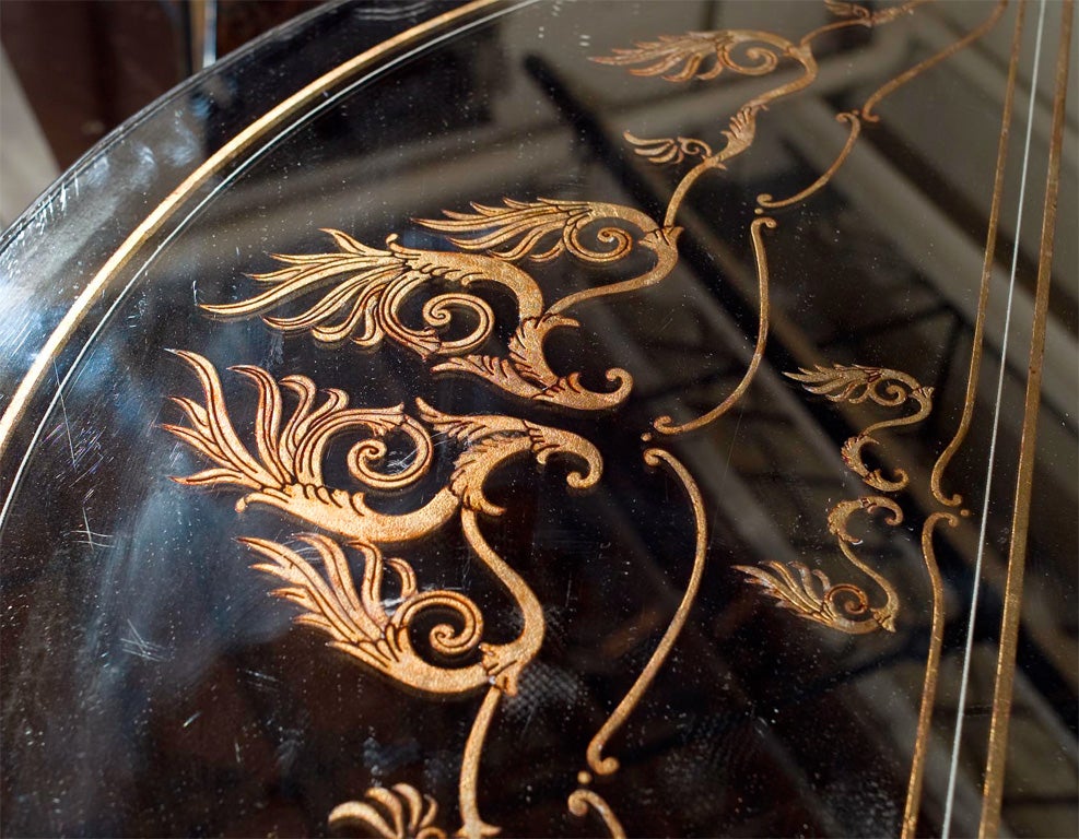 Mid-20th Century Pair of Gilt Decorated Églomisé Mirrored Demilune Console Tables
