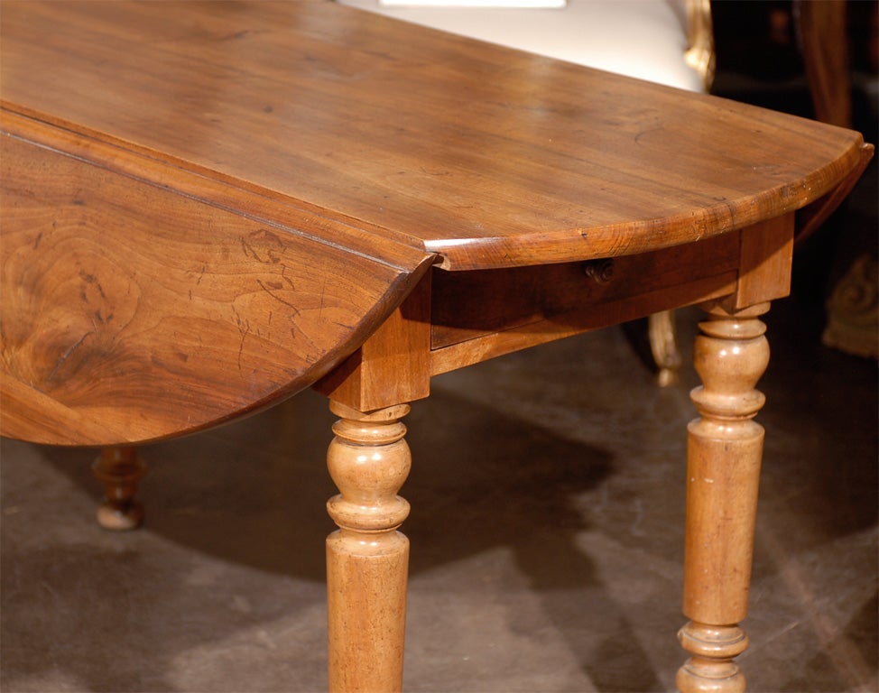 French Oval Drop Leaf Walnut Farm Table with Drawer from the 1870s 1