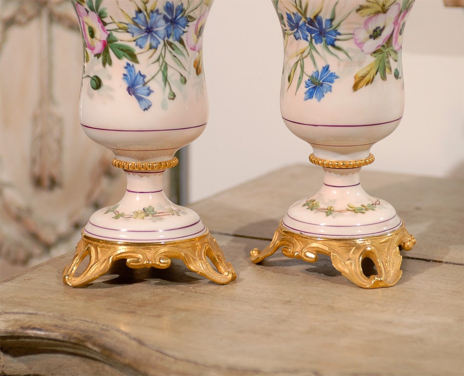 Pair of 19th Century French porcelain flambeaus 1