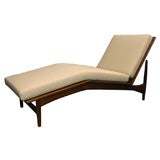 Walnut and linen chaise lounge with  adjustable back, mfg. Selig