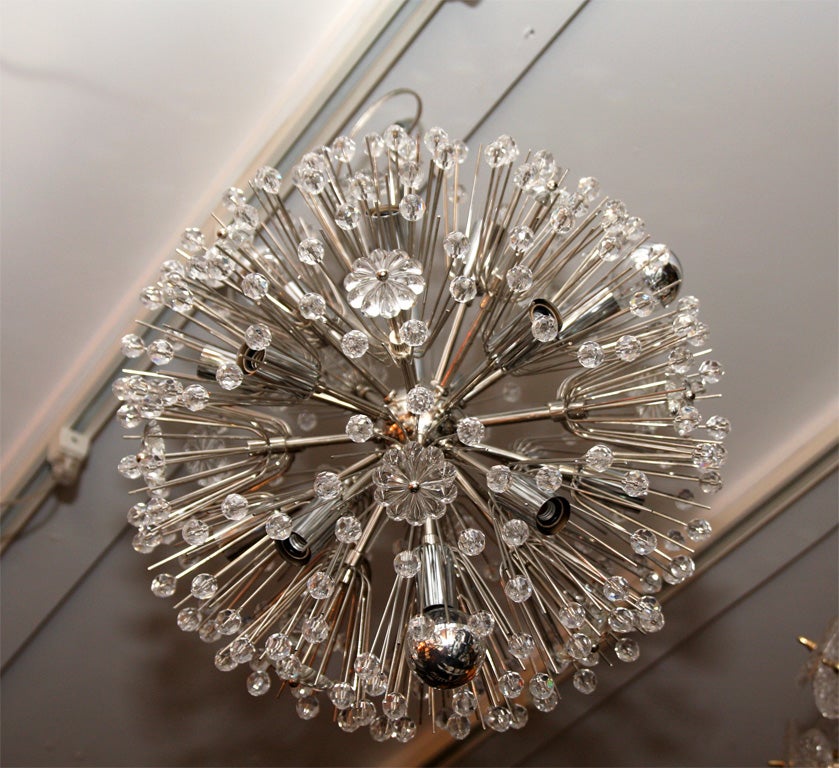 Custom Austrian snowflake crystal chandelier in nickel finish. Customization is available in different sizes and finishes.