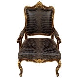 Pair of French Gilt and Walnut arm chairs