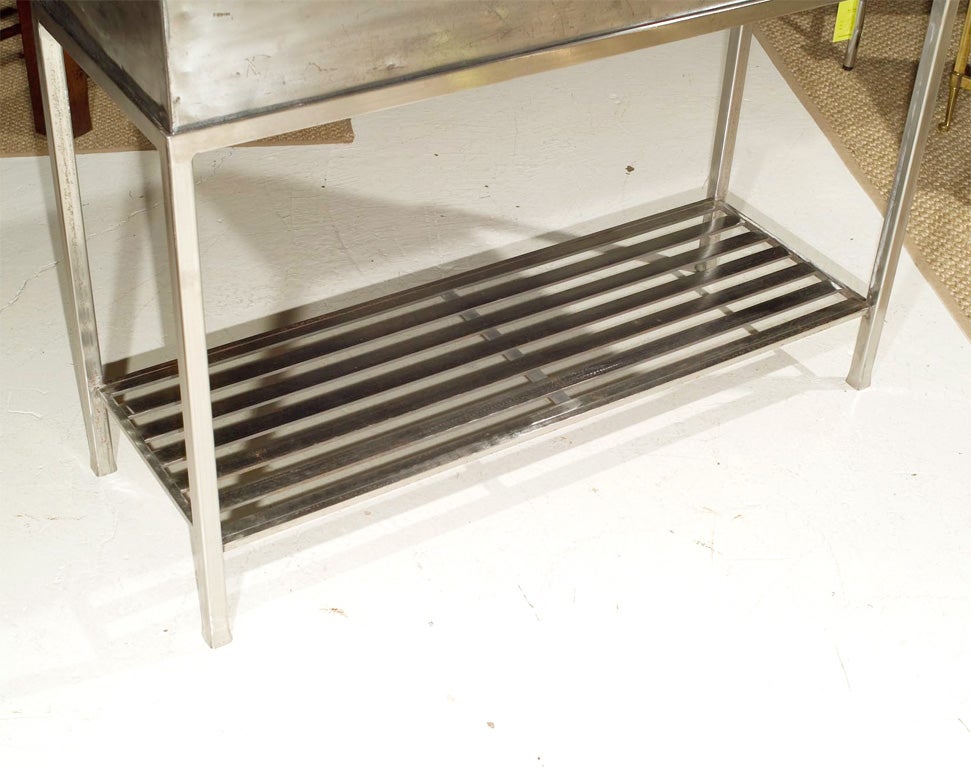 Polished Steel Travel Trunk on Stand