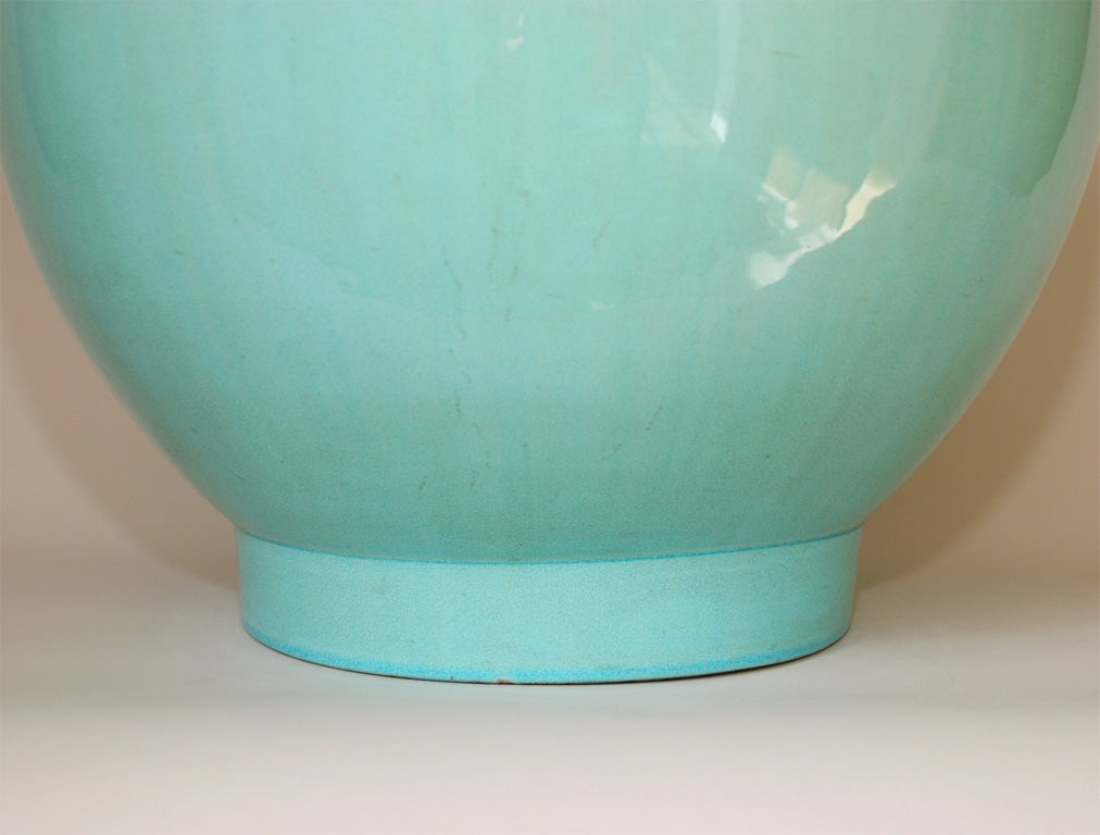 Beautiful light aqua glaze fading to white at mouth, which was longer, but has been cut down into a Japanese style wave pattern.