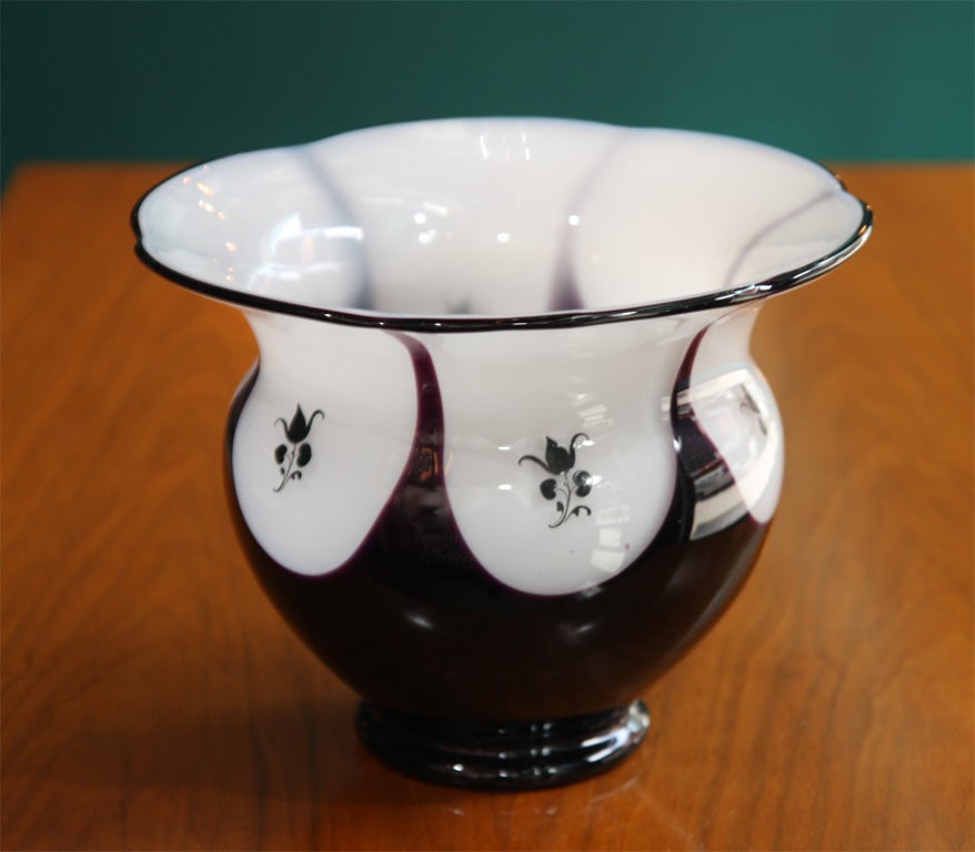 Glass vase in aubergine and white decorated with little flowers. By Michael Powolny, Austrian 1920.

6 1/2