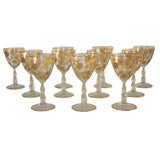 Set of Eleven Gilt and Etched Colorless Glass and Stemware