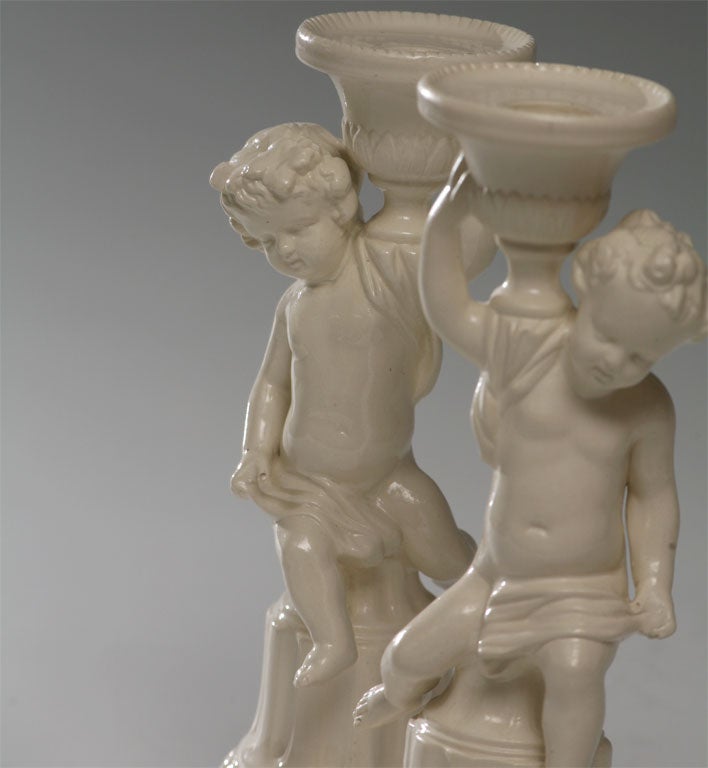English Pair of Minton Salt-Glazed Figural Candlesticks For Sale