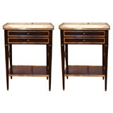 A Pair of Mahogany and Marble Top Tables by Jansen