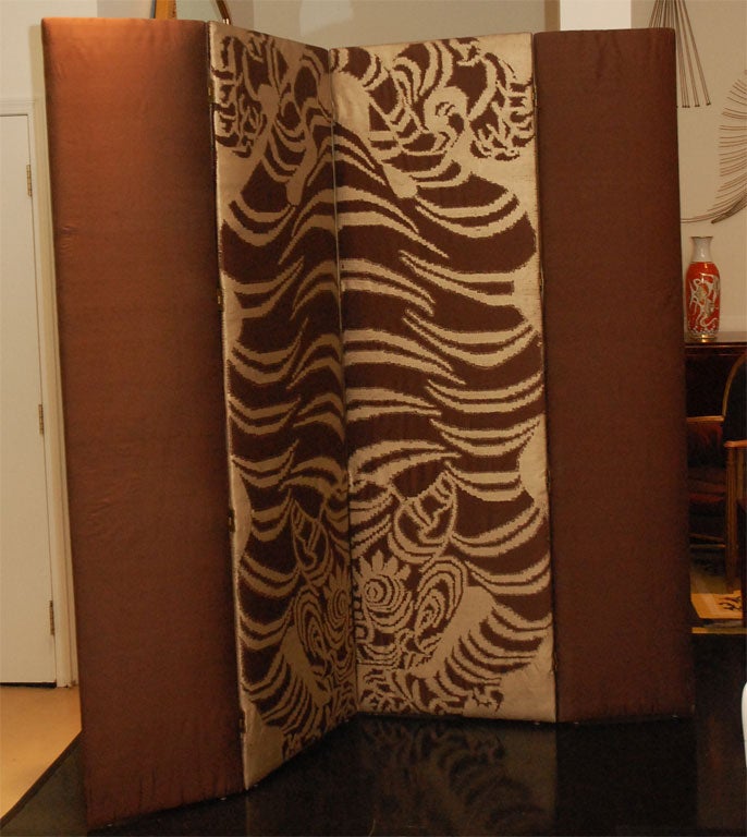 Large screen upholstered in silk with Tiger pattern in center. Four panel screen, one of a kind.