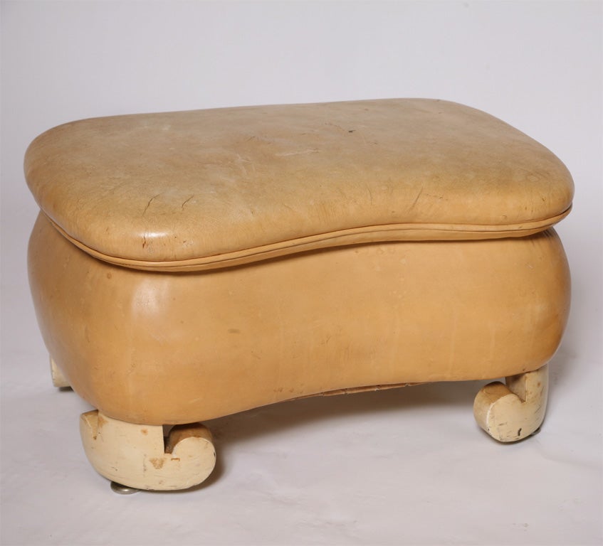 Cute little leather stool with wood legs
