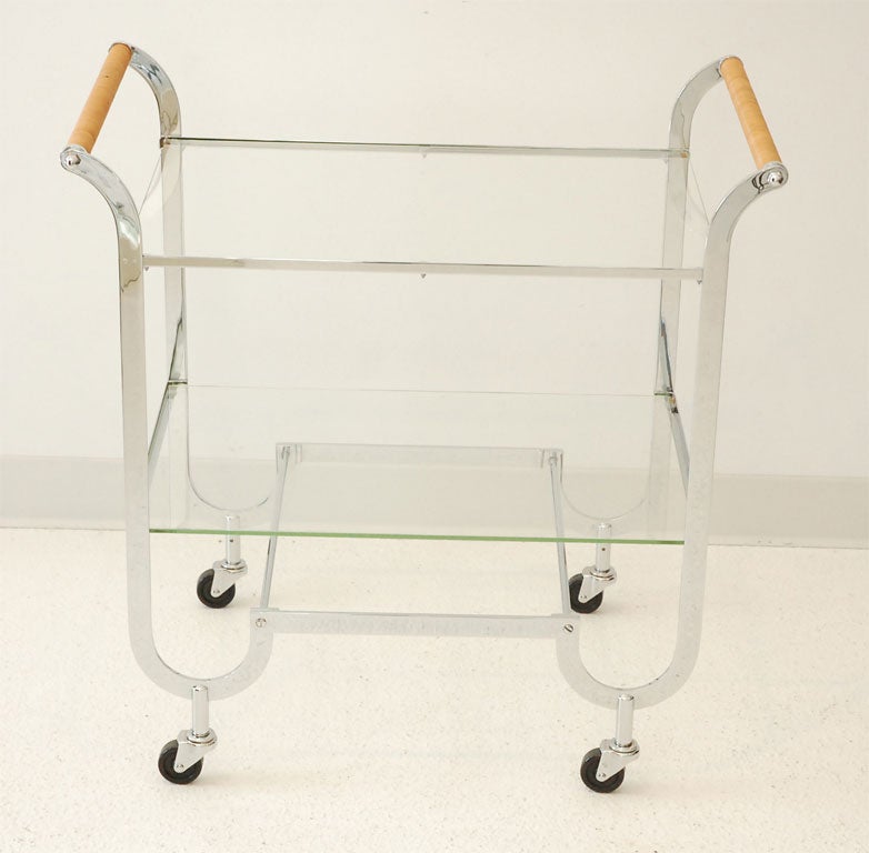 A Chrome Plate and Glass Drinks Trolley