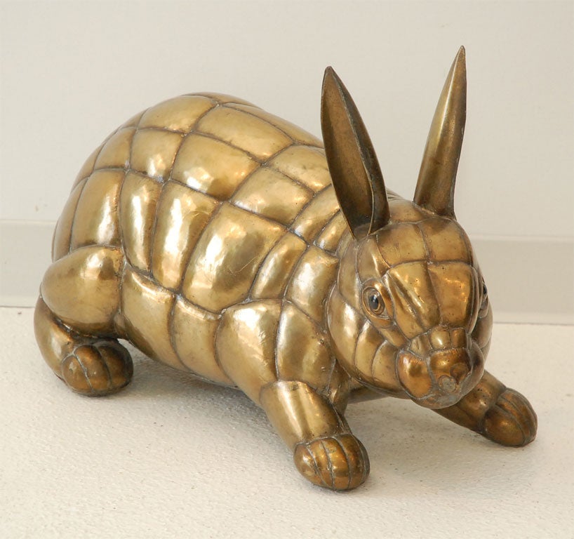 Large, bewitching mixed metal rabbit sculpture signed and numbered 