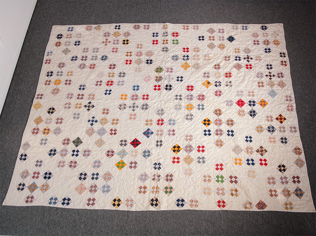 19THC MINIATURE  POSTAGE STAMP QUILT  IN A NINE PATCH PATTERN .GREAT DESIGN BEUTIFUL CALICOS FABRICS FROM NEW ENGLAND  .CONDITION IS MINT.THIS SMALL SCALE POSTAGE STAMP QUILT ARE THE MOST DIFFICULT TO FIND AND CREATE.GREAT ADDITION TO ANY AMERICANA