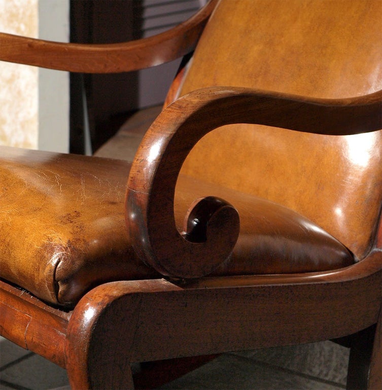 Antique English Regency mahogany leather rocking chair In Good Condition In New Orleans, LA