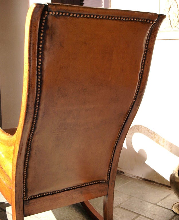 Antique English Regency mahogany leather rocking chair 1