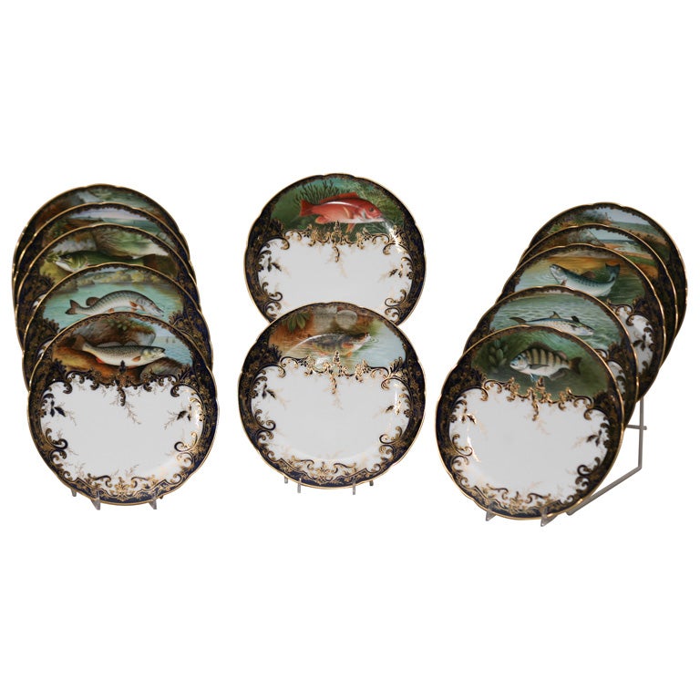 Set of 12 Hand Painted  Fish Plates