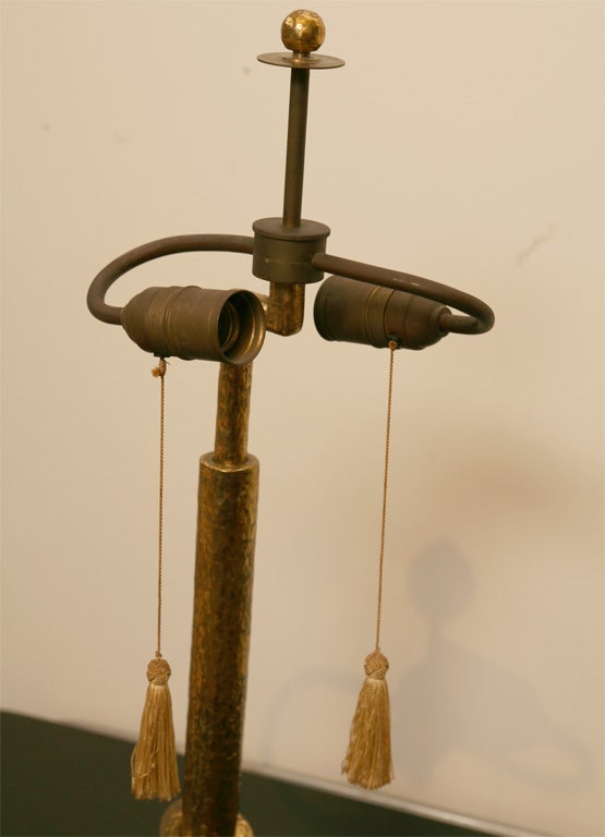 Austrian, hammered and gilted brass lamp in Wiener Werkstatte style.<br />
Designed by Hans Ofner (1880-1939); architect, designer, ilustrator.<br />
Ofner studied under Josef Hoffmann in Kunstgewerbeschule in Vienna.<br />
Projcts: Schiessl's