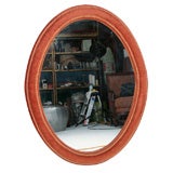 A Napoleon III Oval Mirror with Original Velvet Frame