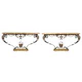 A Fine Pair Louis XV Style Iron and Breche d'Alep Consoles