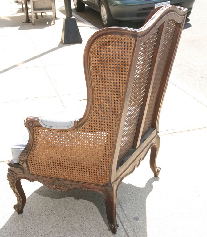caned wingback chair