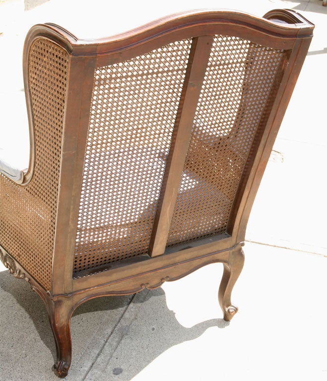 20th Century French Caned Wing Chair