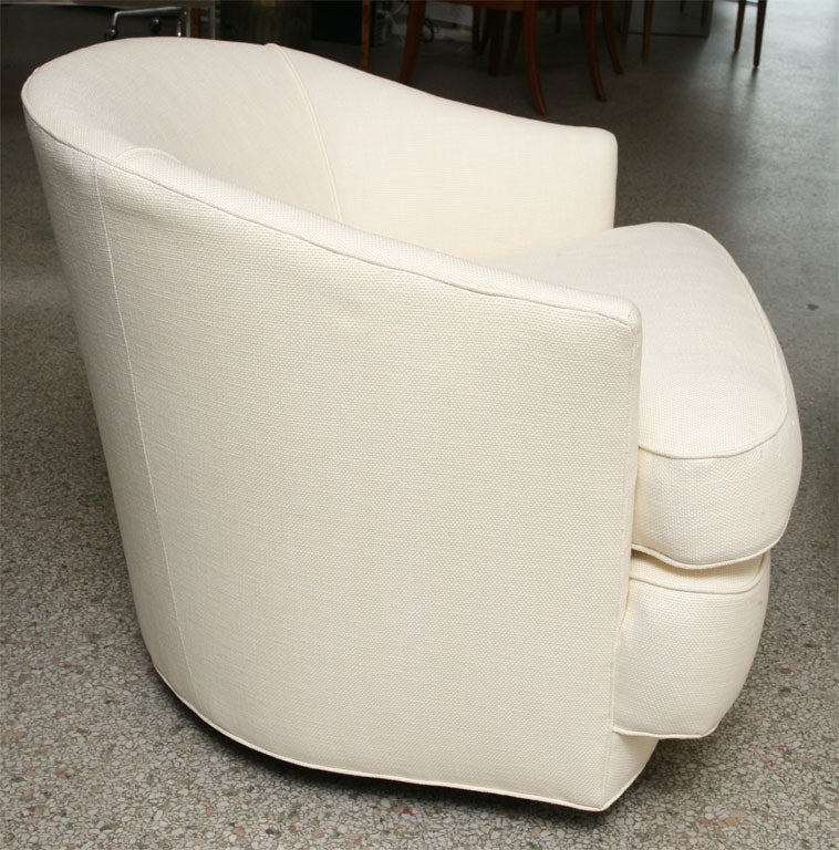 Upholstery Pair of Swivel Lounge Chairs by John Stuart