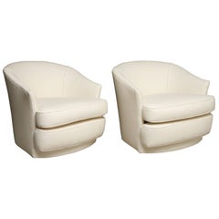 Pair of Swivel Lounge Chairs by John Stuart