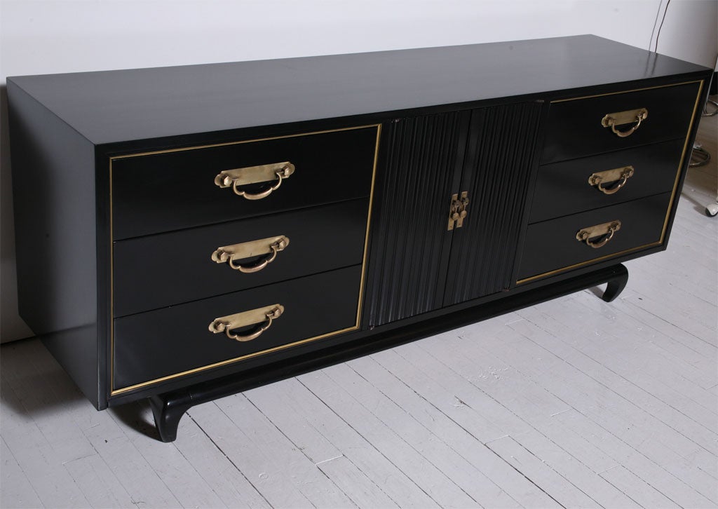 Cabinet / Console / Dresser by American of Martinsville, stamped. 6 drawers, and 2 doors reveal 3 drawers. A quality piece with Hollywood Regency stylings.***Contact/Shipping Information: AOL (American Online) users may experience difficulties