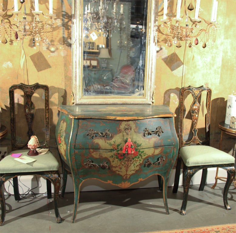 Painted Venetian chest in deep turquoise blue with brilliant floral design and original hardware.